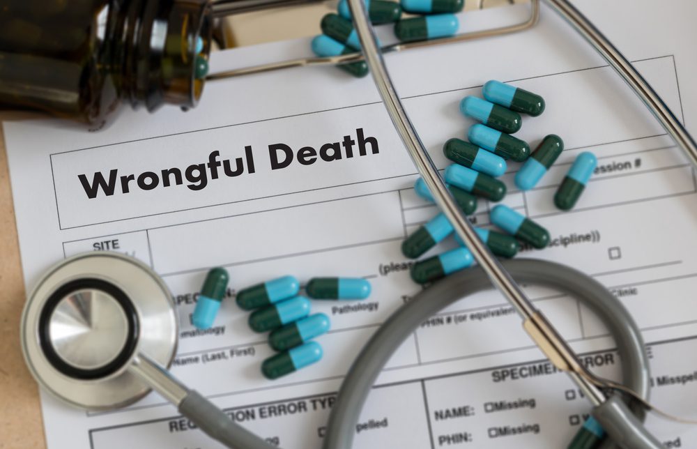 Wrongful Death Lawyer Youngtown, AZ - Wrongful Death Doctor talk and patient medical working at office